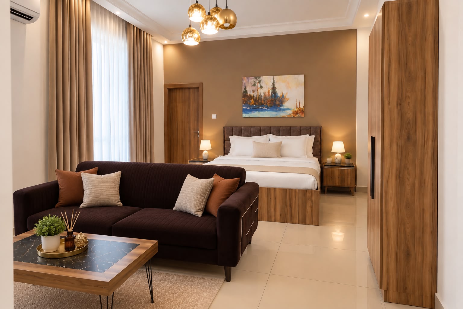 Salon meublé d’un appartement ELFA Suites